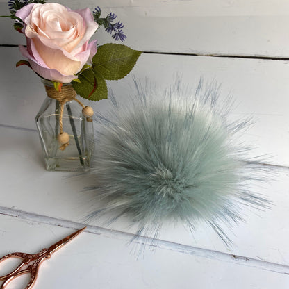 Sea Glass coloured faux fur pom pom. Detachable option. Handmade