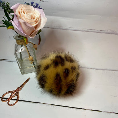 Jaguar faux fur pom pom. Detachable option. Handmade