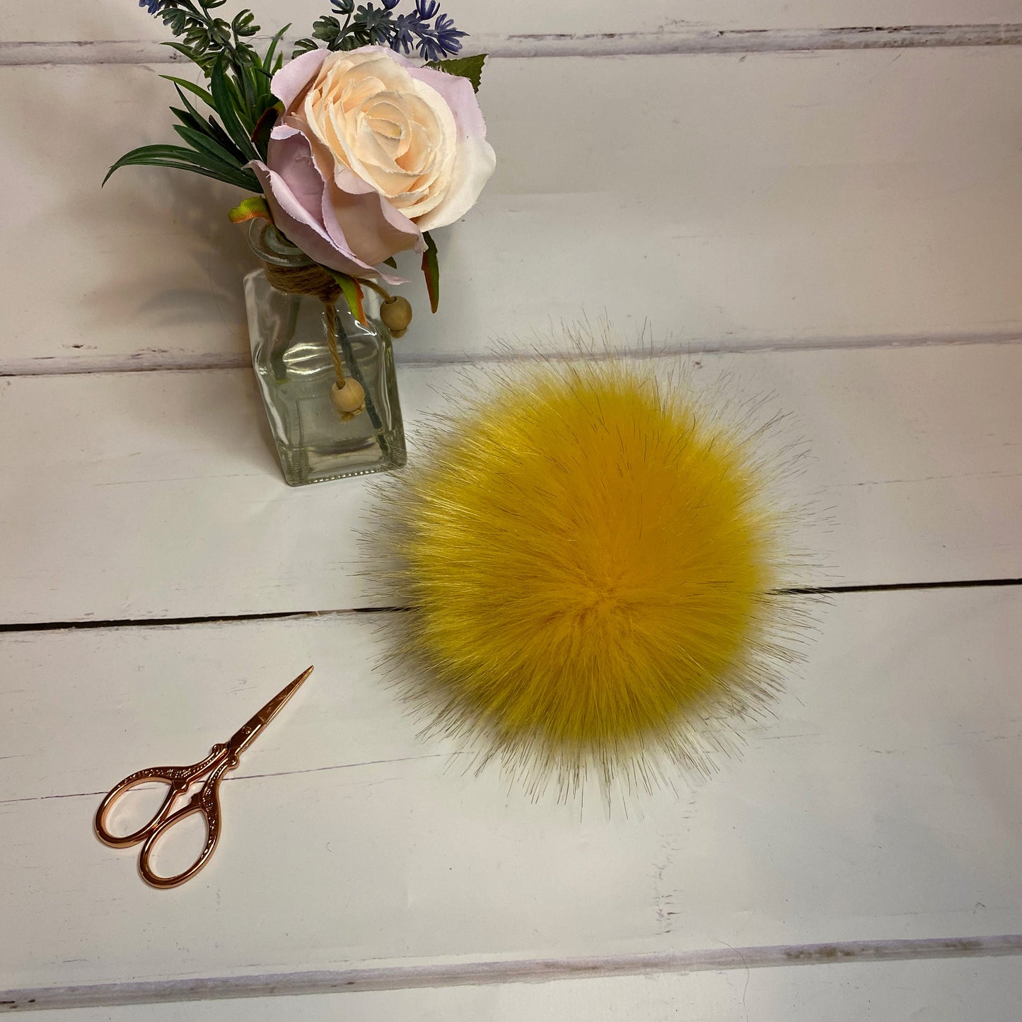 Ochre coloured faux fur pom pom. Detachable option. Handmade