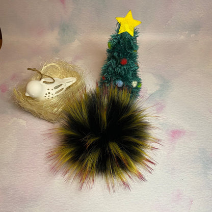 Mockingjay coloured faux fur pom pom - a black with yellow and red tips. Detachable option