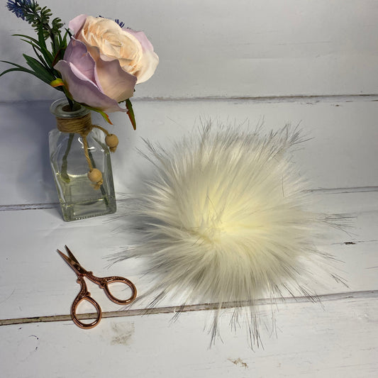 Silk handmade faux fur pom pom. Detachable option. Handmade